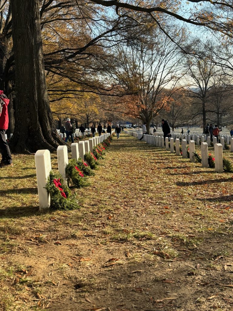 Gravestones with wreaths laid on them